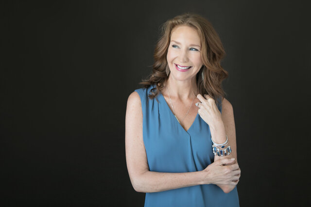 StellaWilson-BeBalanced Standing in front of black background